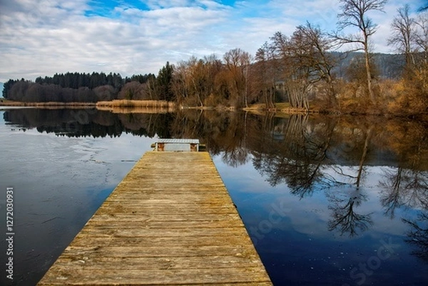 Obraz small pond of Dietrichstein in the Southern Austrian province of Carinthia on a cold autumn day with water reflection