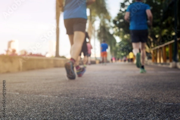 Fototapeta Blurred or De-focus man jogging in the park with gradient effect,Fitness concept.