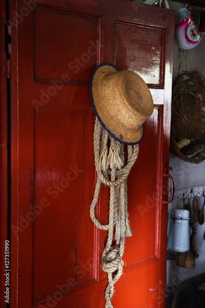 Obraz Victorian Straw Hat on Door