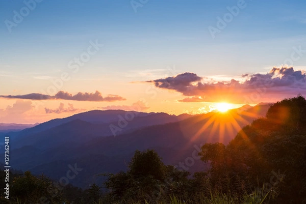 Fototapeta Sunset in mountains