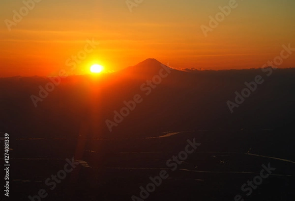 Fototapeta Sunset sky above the clouds with a view of Mount Fuji near Tokyo, Japan