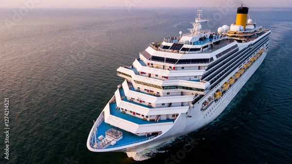 Obraz A cruise ship is sailing at sea.