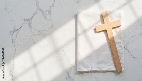 Obraz Wooden cross on white cloth against marble background