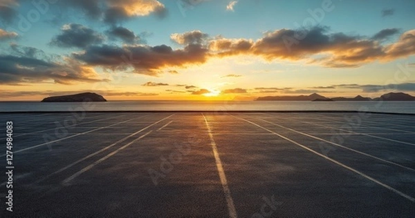 Obraz Sunset over ocean, empty asphalt parking lot, islands