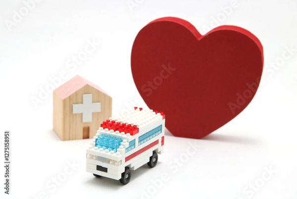 Fototapeta 医療と救急のイメージ – ハート・病院・救急車のミニチュア