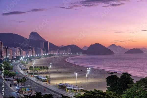 Obraz Copacabana Beach and Sugar Loaf Mountain at twilight with incredible violet morning light, Rio de Janeiro, Brazil	