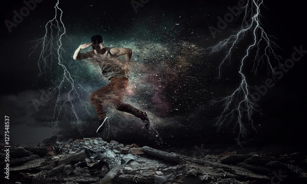 Obraz B-boy performing some moves . Mixed media