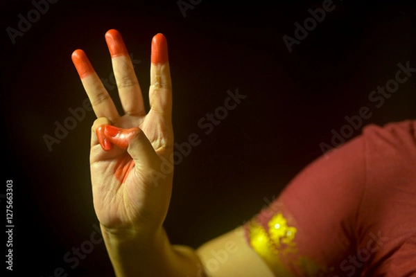 Obraz Trichule a Hand gesture in Indian classical dance form called Bharatanatyam. India.