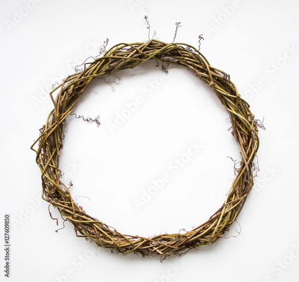 Fototapeta Handmade wreath of vines, blank for decoration. Flat lay, top view, view from above