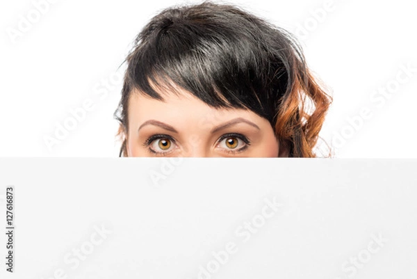 Obraz female brown eyes closeup and a poster on a white background