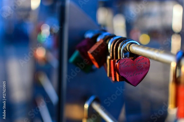 Obraz Love padlocks or love locks on a bridge in the harbor of hamburg on blurred sunlight background , love, paris, locks, lock, symbol, heart, white, romance, lifelong, padlock, red