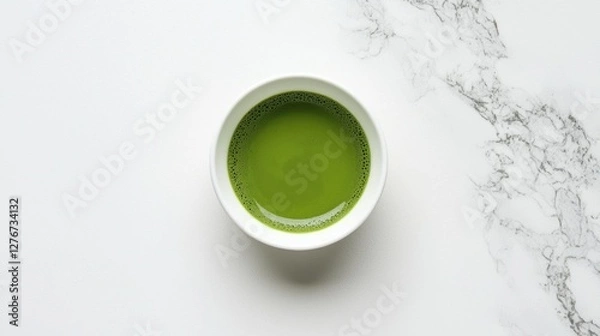 Fototapeta Simple white bowl filled with perfectly smooth green matcha, Japanese tea ceremony inspiration, minimalist styling