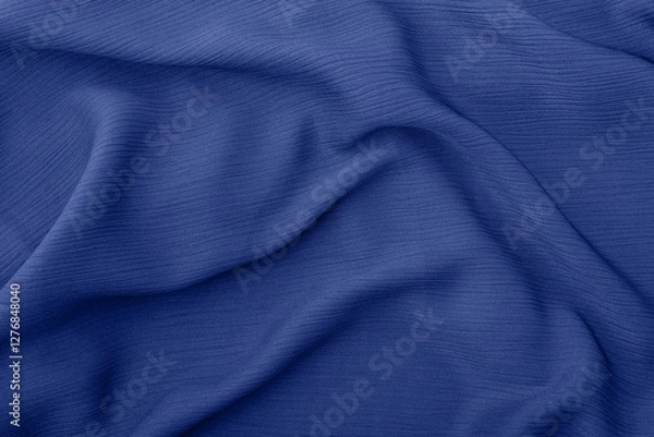 Fototapeta Elegant blue fabric texture with soft flowing folds and creases	