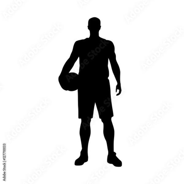 Fototapeta Basketball player standing and holding ball, vector silhouette