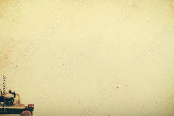Fototapeta A nostalgic typewriter paper texture with old ink smudges, soft grain, and a subtle yellowed tint.