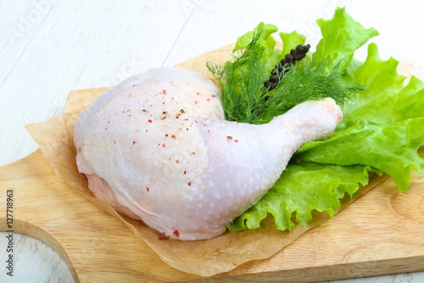 Fototapeta Raw chicken leg