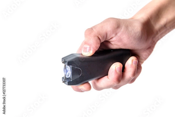 Obraz Taser in hand on white background