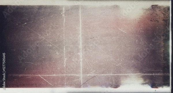 Fototapeta Old retro dirty scratched film scan for textures and overlays design with scratches; abstract image of an art texture background. Film grain texture, light leaks with grain texture