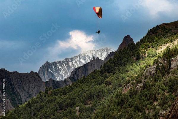 Obraz Paragliding over the clouds sunset view at Bir Billing Himachal Pradesh India. Clouds in the sky