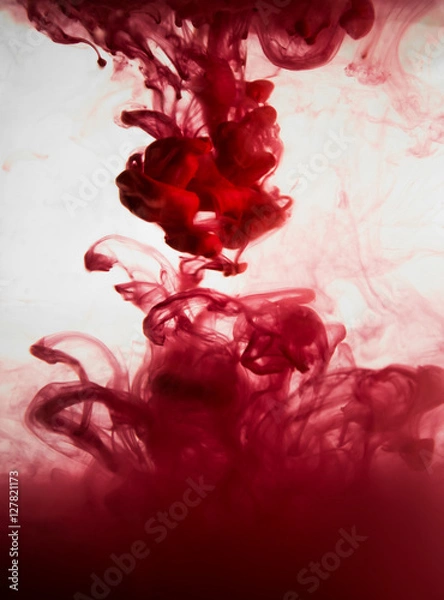 Obraz red dye in water