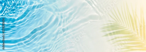 Obraz abstract sand beach with blue transparent water wave and palm leaf shadow on sunny tropical background banner, beautiful nature scene with copy space for travel, vacation and beauty spa 