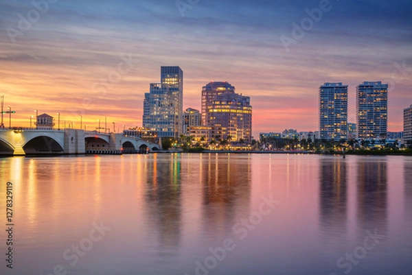 Obraz West Palm Beach, Florida, USA. Cityscape image of West Palm Beach, Florida with reflection of the city skyline in the water at beautiful sunset.