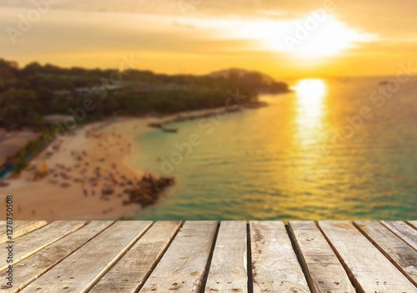 Obraz Wooden table top on the beach or sea.Party on the beach  sunset time concept.For montage product display or design key visual layout.View of copy space.