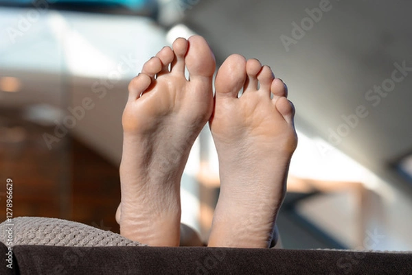 Fototapeta woman feet sole white skin texture macro intimate body part close up view laying unrecognizable pose by model