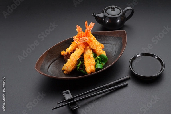 Obraz Tempura shrimp on a black plate