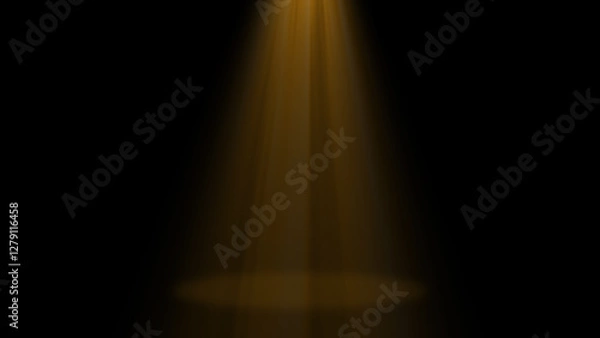 Fototapeta A single golden spotlight shines brightly from the top onto a studio stage, casting a warm and luxurious glow against the black background