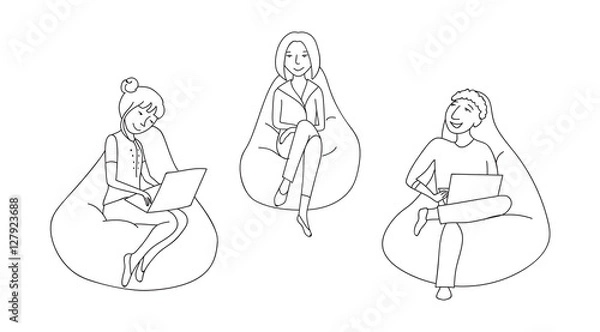 Obraz People sitting and working in a bean bag chair