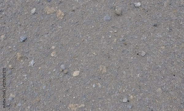 Fototapeta Close-up of textured gray asphalt surface