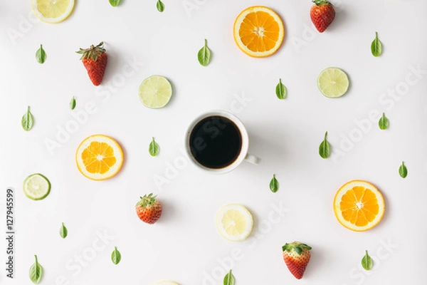 Fototapeta Colorful  coffee pattern made of citrus fruits and strawberries.