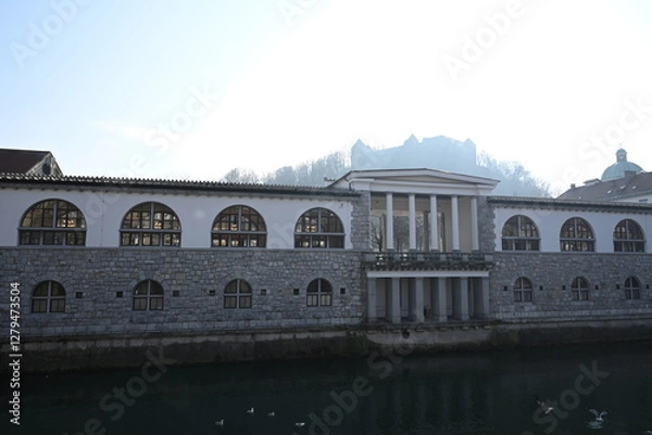 Fototapeta Historic Colonnade and Riverside Scene in a Charming European City on a Sunny Day - Ljubljana