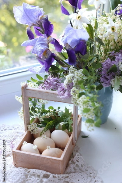 Fototapeta easter eggs in a basket