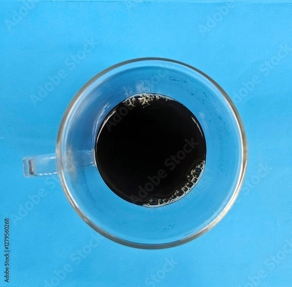 Fototapeta The inviting aroma of freshly brewed coffee fills the air as the warm cup nestles in your hands. Each sip delivers the perfect balance of flavor and comfort, awakening the senses and refreshing your e