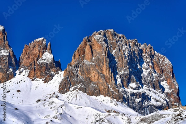 Obraz Beautiful panoramic view to the Sellaronda - the ski circuit around the Sella group in Dolomites, Italy - Badia, Gherdeina, Fascia. Extraordinary snowy peaks of the dolomites, southern Alps.