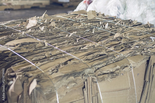 Obraz cardboard piled getting ready to be recycled