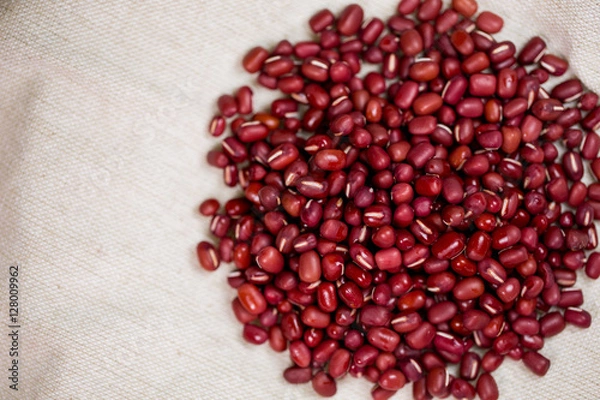 Obraz azuki beans , red beans on linen.