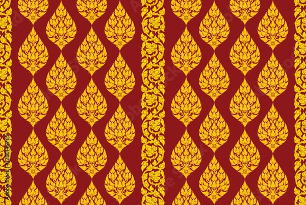 Fototapeta Traditional Thai art seamless bold gold colored floral arabesque pattern in damask style motifs suitable for wallpaper, cloth, curtain, blanket, textile, tiles and fabric design isolated over red.