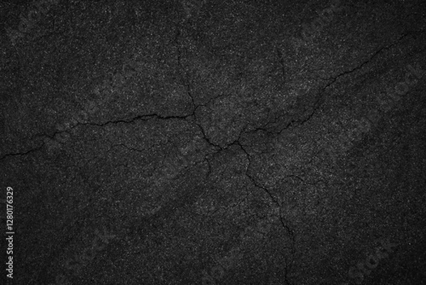 Fototapeta Crack background texture of rough asphalt top view.