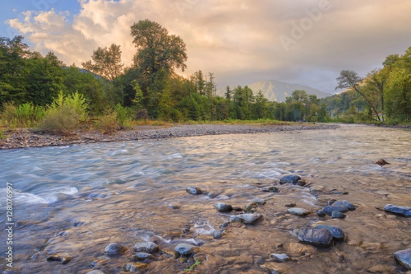 Obraz The rocky shore of a mountain river.