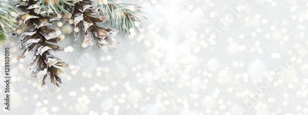 Obraz Pinecones and fir tree on sparkling background.