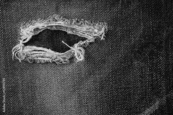 Obraz Black torn denim texture.