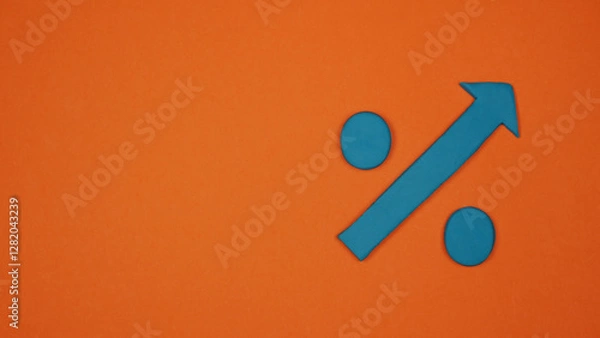 Fototapeta Blue arrow on orange background transforming into a percentage sign.