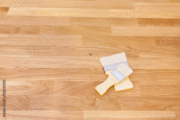 Obraz Piant brush with Wood surface.