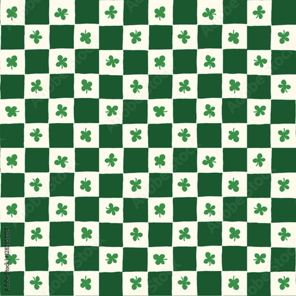 Fototapeta Seamless vector repeating pattern with ditsy hand drawn checkerboard in green and cream and a four leaf dark green clover shamrock. St Patricks day small lucky clover background.