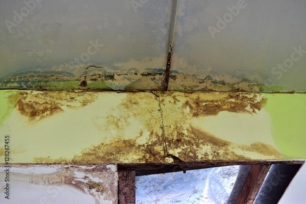 Fototapeta Water leaks on the ceiling Causing damage, the ceiling tiles and cement.