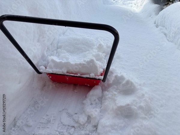 Fototapeta スノーダンプ　雪寄せ作業　冬　大雪　スコップ　イメージ