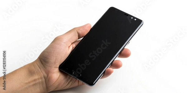 Fototapeta Hand holding a modern black smartphone with a blank screen ready for branding, app development, UI design, or business promotion use